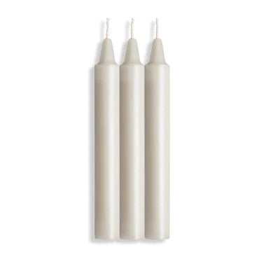 three white candles with white wicks