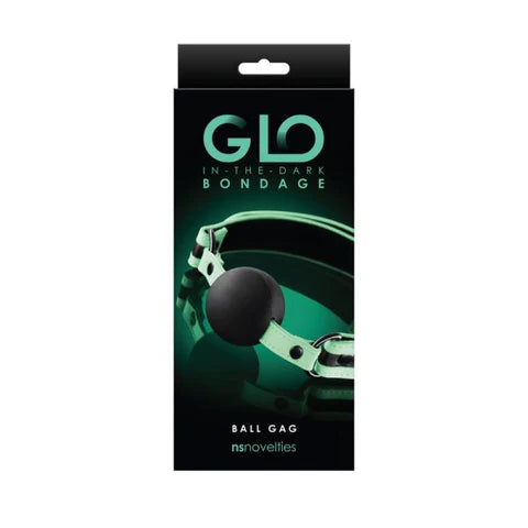 a black and green display box depicting a black ball gag with glow in the dark straps