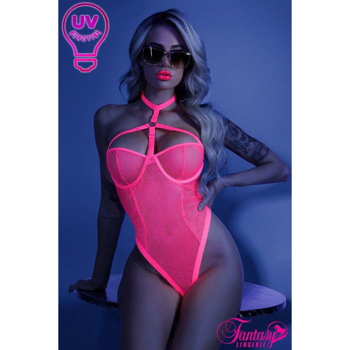 blonde female leaning on table in pink fishnet teddy front view