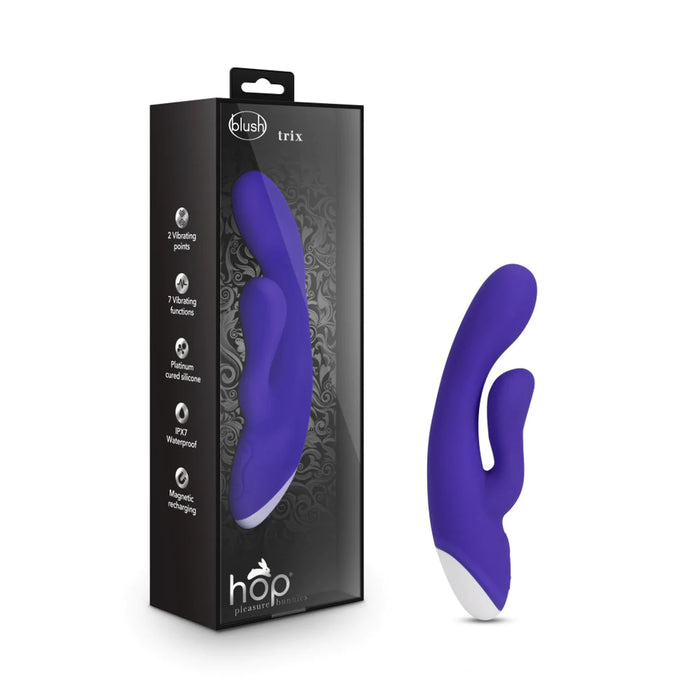 purple vibrator with curved tip and clit stim on box
