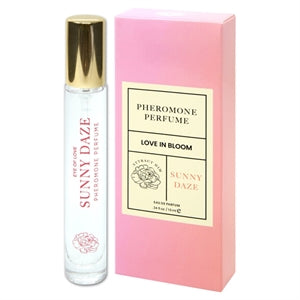 pheromone spray in pink box with bottle beside