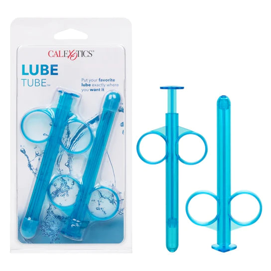 a blue lube dispensing syringe next to its additional tube, shown next to its plastic packaging