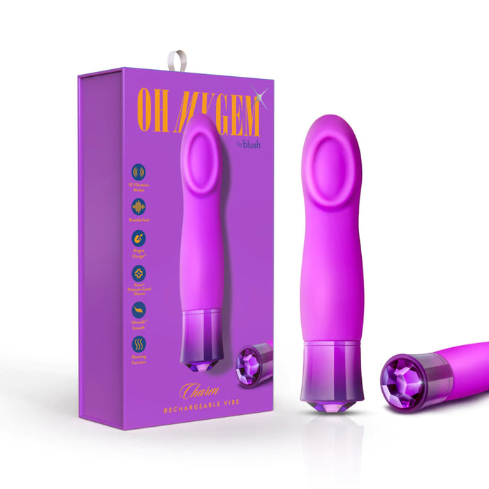 purple vibrator with ridges and circle indent top with gem on bottom