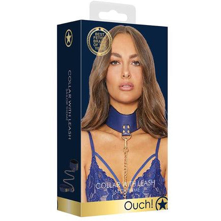box with picture of woman wearing blue collar with gold chained leash