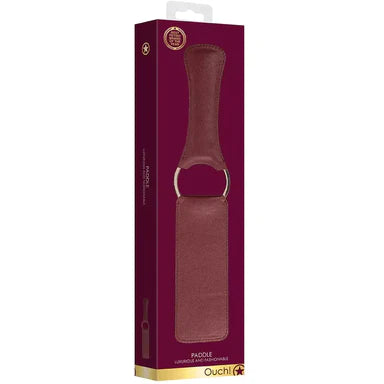 a burgundy box depicting a burgundy paddle that is joined in the middle by a gold circle 