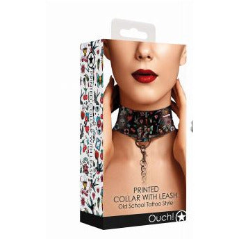 box with picture of a woman with black collar with tattoo pattern with a chain leash