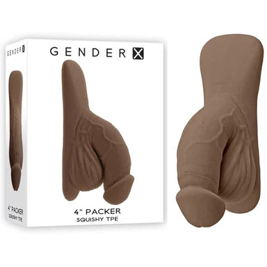 a white display box depicting a brown flaccid penis shaped dildo with balls and a large base