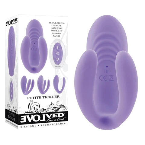 A light purple vibrator with a ridges for clitoral stimulation and two vibrating internal points. It is shown next to its white display box