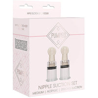 pink box with silver writing and picture of clear nipple suction set