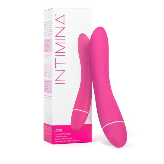 a lightly angled pink vibrator leaning against its white display box