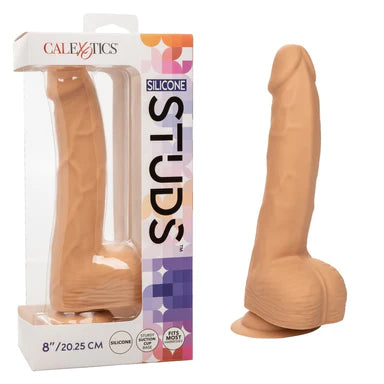 a beige detailed penis shaped dildo with balls and a suction cup, shown next to its display box