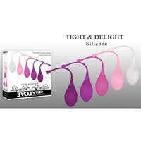5pc kegel ball set with tails in different colors next to box