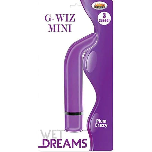 a purple g spot vibrator with a pointed curved tip and a purple cap shown in its plastic packaging