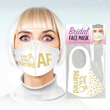 woman wearing soon to be married AF white with gold face mask source adult toys