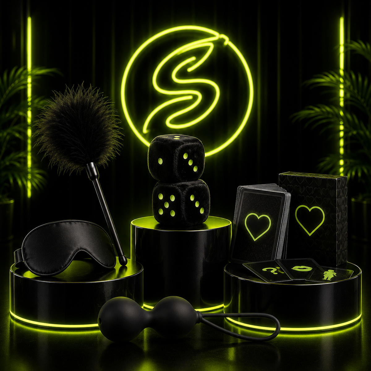 Collection of adult lifestyle accessories including a blindfold, feather tickler, plush dice, card game, and silicone exercise balls, displayed on black podiums with neon green accent lighting and a glowing “S” logo in the background.