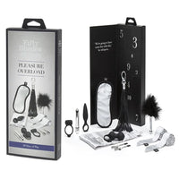 a bondage kit that includes grey ties, silver nipple clamps, a black feather tickler, a black flogger, black kegal balls, a grey blindfold, a black anal plug, a silver vibrator and a black vibrating cockring. Shown with its display box that has numbered doors on the inside cover