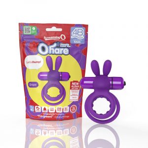 purple silicone rabbit double ring with purple bullet next to screaming o package
