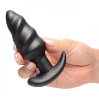 Black swirl anal plug example photo.