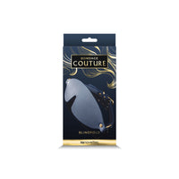 Couture blindfold inside packaging.