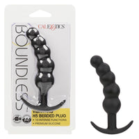 black vibrating curved anal plug with 5 balls and bottom base stopper. beside plastic packaging