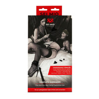 Complete surrender bed tether seduction set inside packaging.