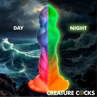 Aqua cock glow in the dark day and night example photo.