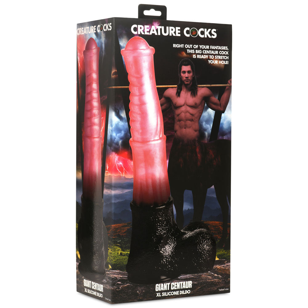 Multi colored giant centaur XL dildo inside packaging.