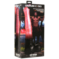 Multi colored giant centaur XL dildo inside packaging.