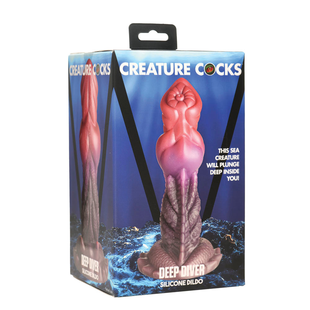 Multicolored deep diver silicone dildo inside packaging.