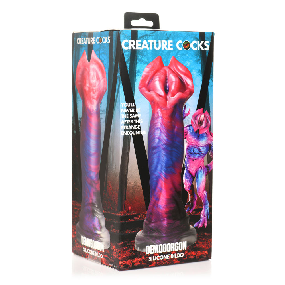Multicolored demogorgon silicone dildo inside packaging.