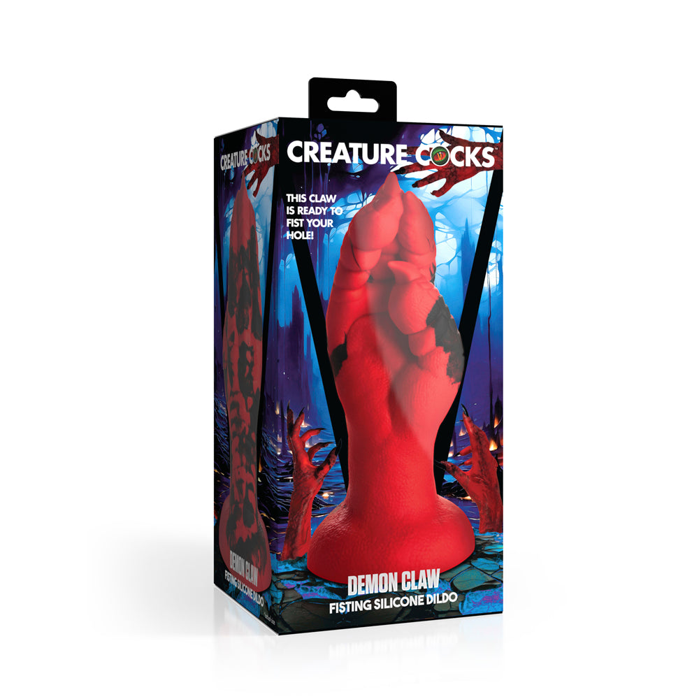Red & black demon claw fisting silicone dildo inside packaging.
