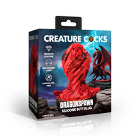 Red dragonspawn large silicone butt plug inside packaging.