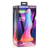 Multi colored galactic cock dildo inside packaging.
