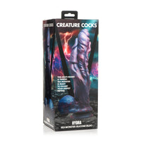 Purple hydra sea monster silicone dildo inside packaging.
