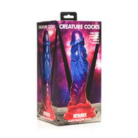 Multi colored intruder alien dildo inside packaging.