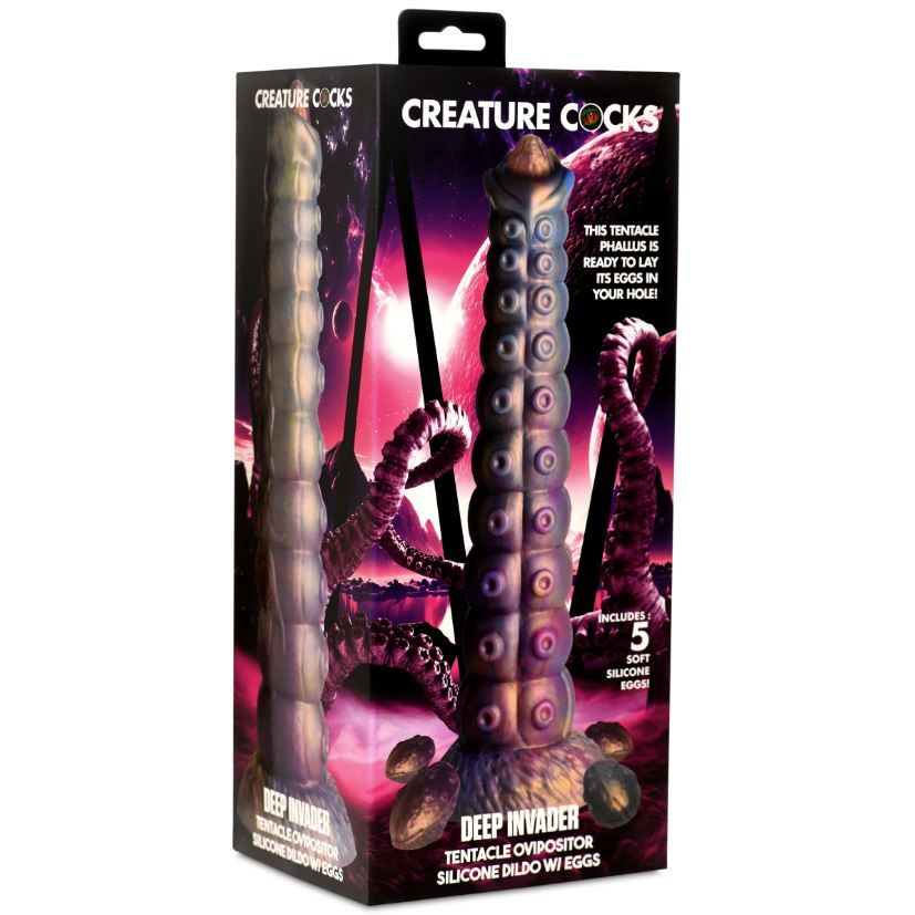 Multi colored deep invader dildo with eggs inside packaging.
