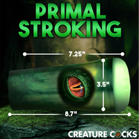 A green cylindrical novelty item labeled 'PRIMAL STROKING' with overlaid dimensions 7.25 inches, 3.
