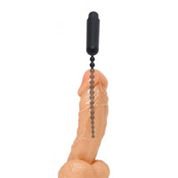 Black vibrating beaded silicone instructional photo.