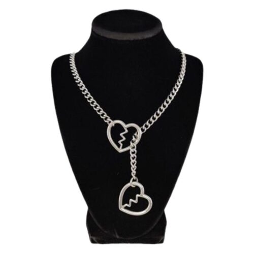 Necklace with heart-shaped pendants on a black mannequin