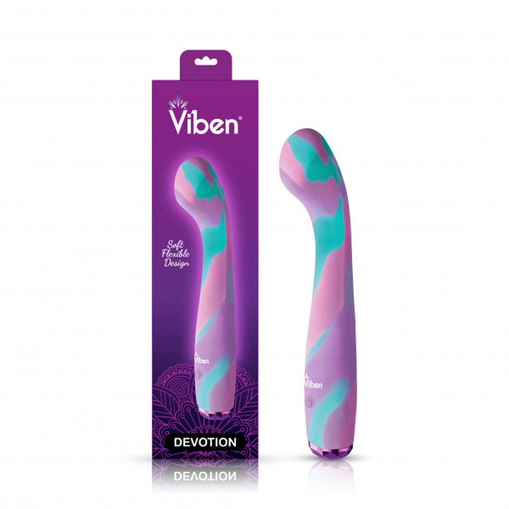Multi colored devotion G spot vibrator beside packaging.