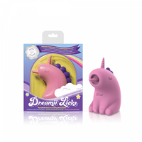 Pink dreamii licks unicorn vibrator example photo beside packaging.