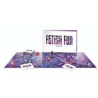Fetish fun kinky game board and game guide example photo beside packaging.