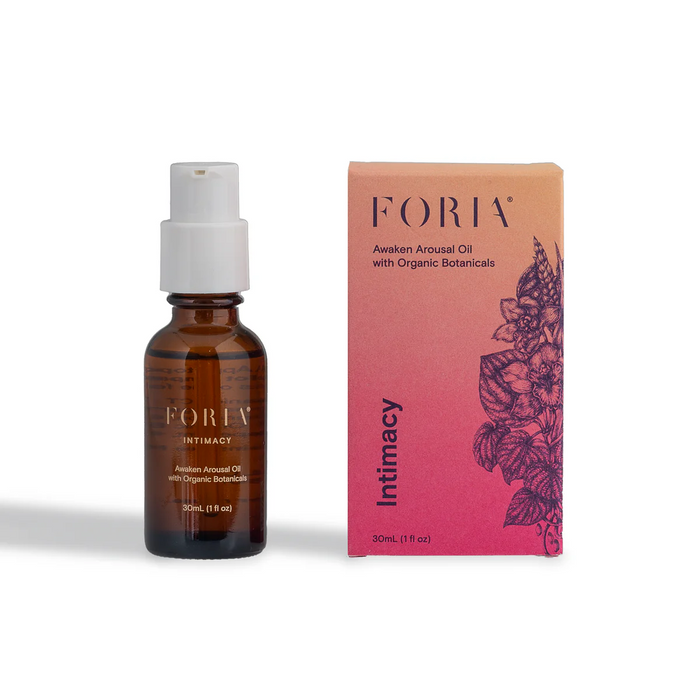 Foria intimacy awaken arousal oil 30ml bottle beside packaging.