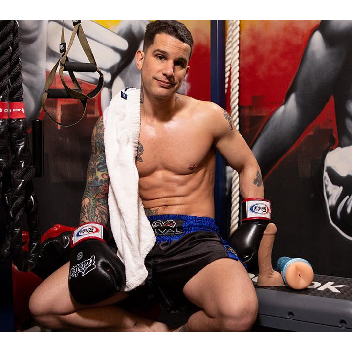 pierre fitch in boxing gloves beside fleshlight