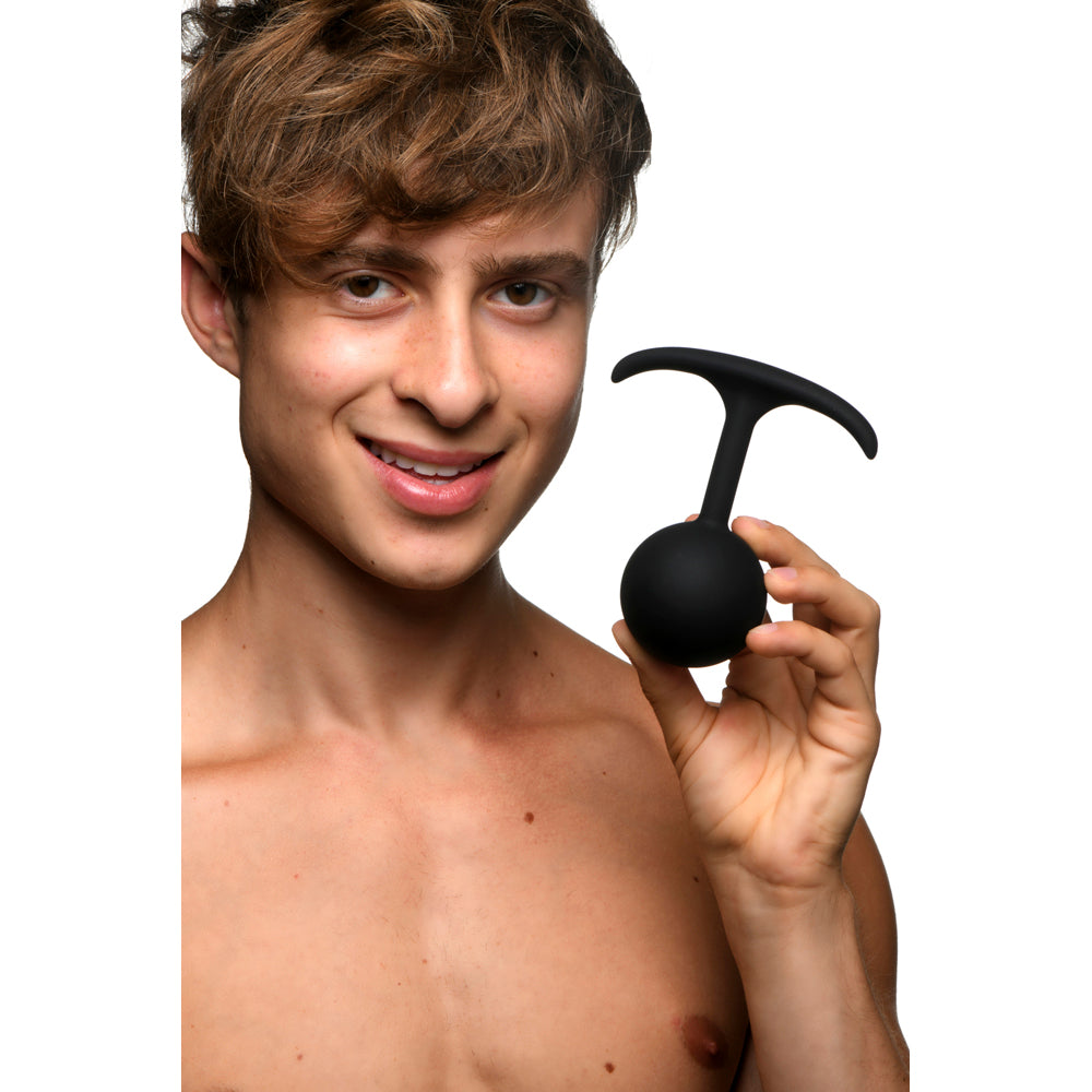 Black weighted XL plug example photo.