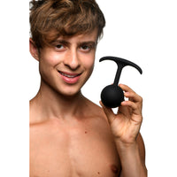 Black weighted XL plug example photo.