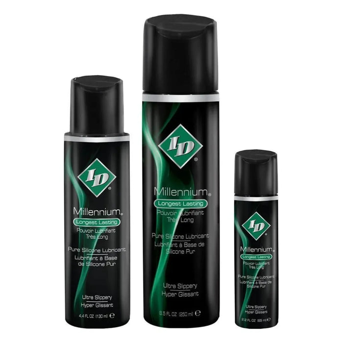 black bottles of lubricant with green writing various sizes 
