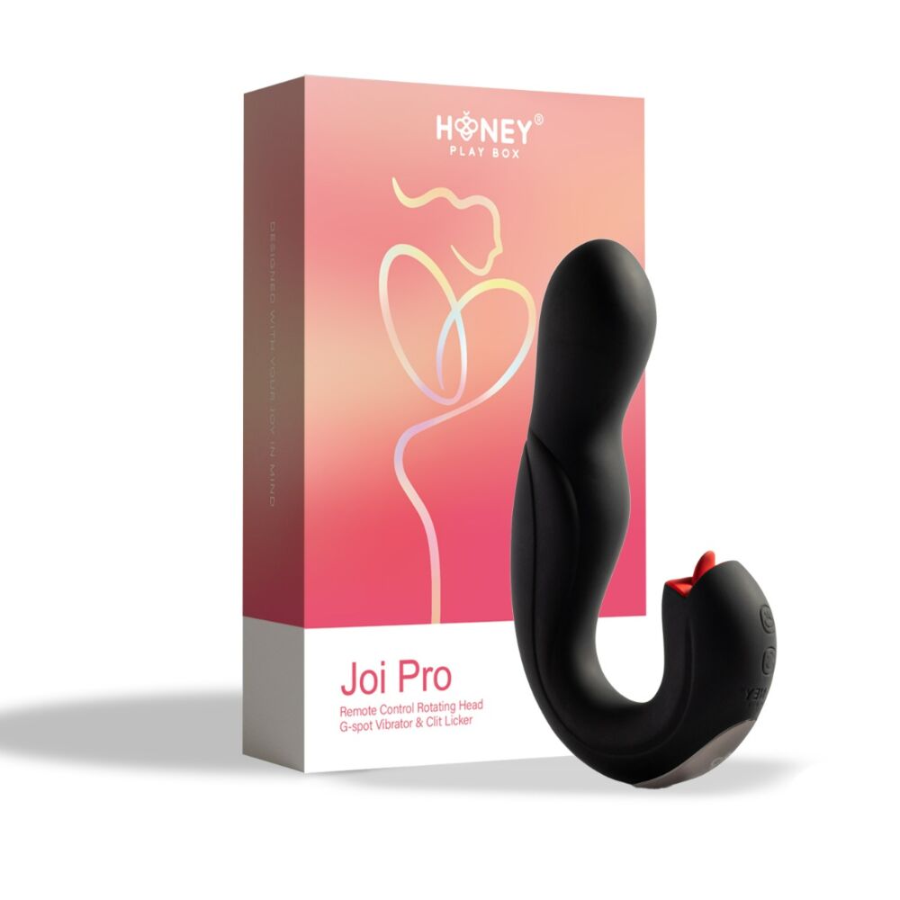 Black rotating head & g spot vibrator beside box