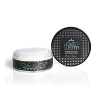 Love & Luster kissable silver diamond dust packaging on a white background.