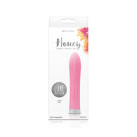 Pink flexible luxe honey compact vibrator inside packaging.